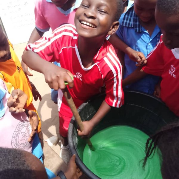 Assumption International Nursery and Primary School Akata Okuku producing liquid soap