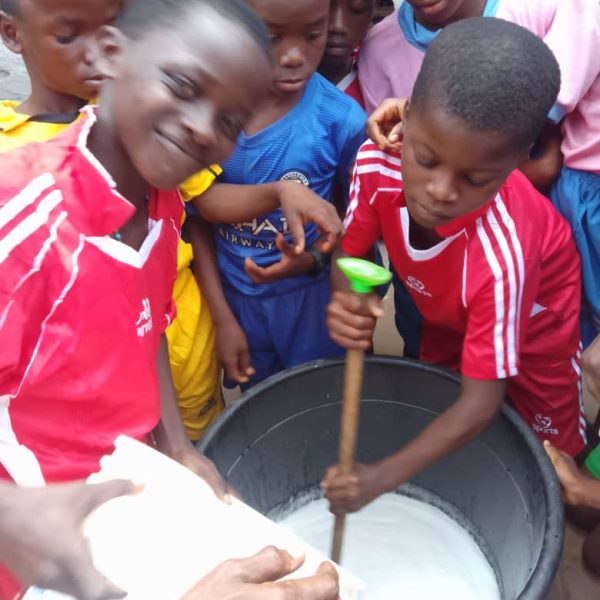 Assumption International Nursery and Primary School Akata Okuku producing liquid soap